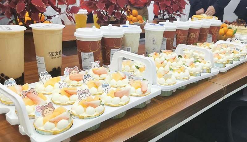 Birthday cake, milk tea, and fruit platter Birthday cake, milk tea, and fruit platter